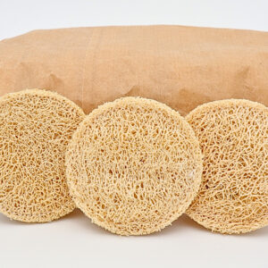 Luffa-Pads im 20er-Pack a brown paper bag with round objects on top of it