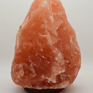 Salzlampe a salt lamp on a white surface