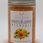 Ringelblumenmeeresalz in Plastikbehälter mit Etikett