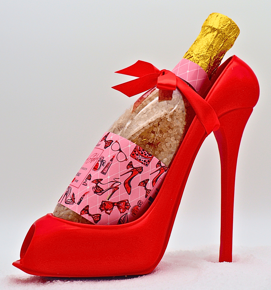 Geschenkset für Damen „boutique style“ Roter Keramik-Stiletto mit Badesalz enthaltender Sektflasche